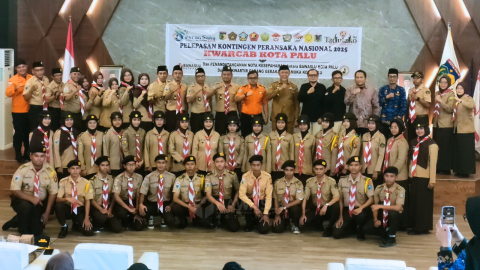 Foto bersama usai kegiatan penandatanganan Nota Kesepahaman antara Bawaslu Kota Palu dengan Kwarcab Gerakan Pramuka Kota Palu